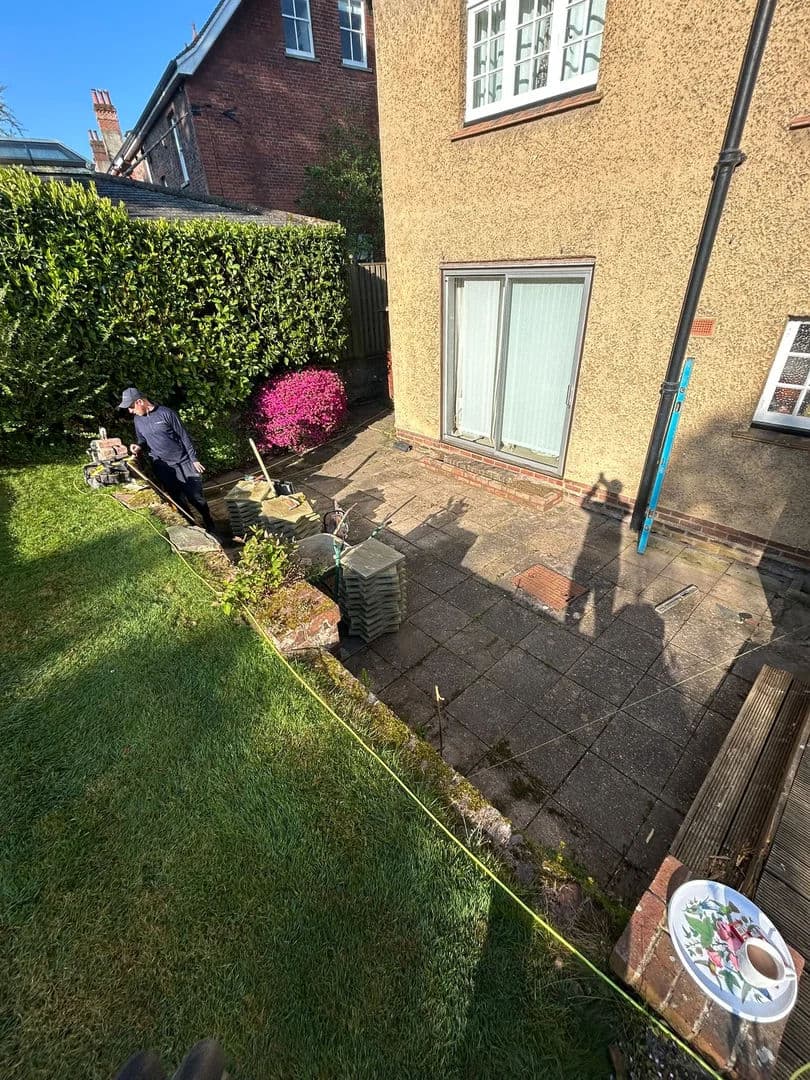 Original concrete patio cracked and uneven before the rebuild